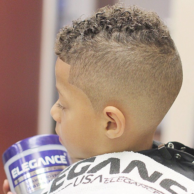 Curls + High Fade Hairstyle for black boy