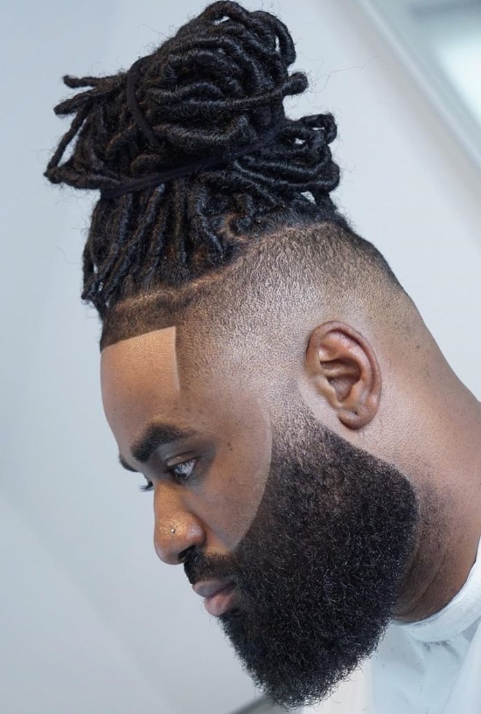 Top Knot on locks + high fade + Full beard