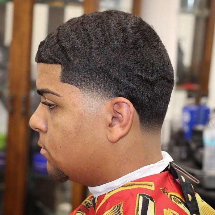 Wavy crew cut + Fade at the temples and the nape of the neck