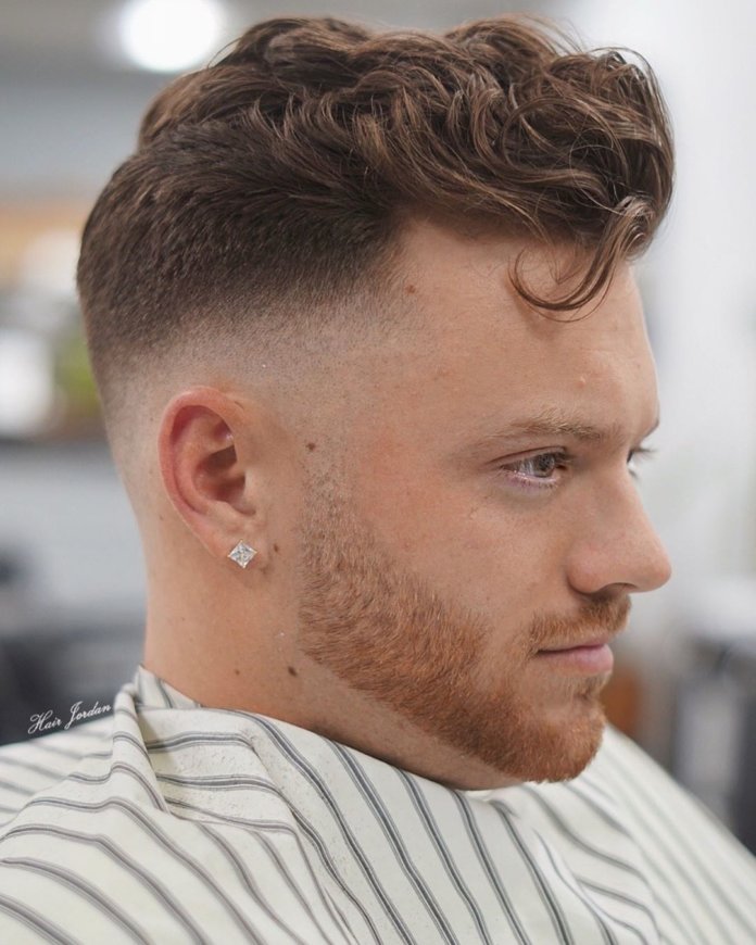 Mid-length wavy hair + medium fade