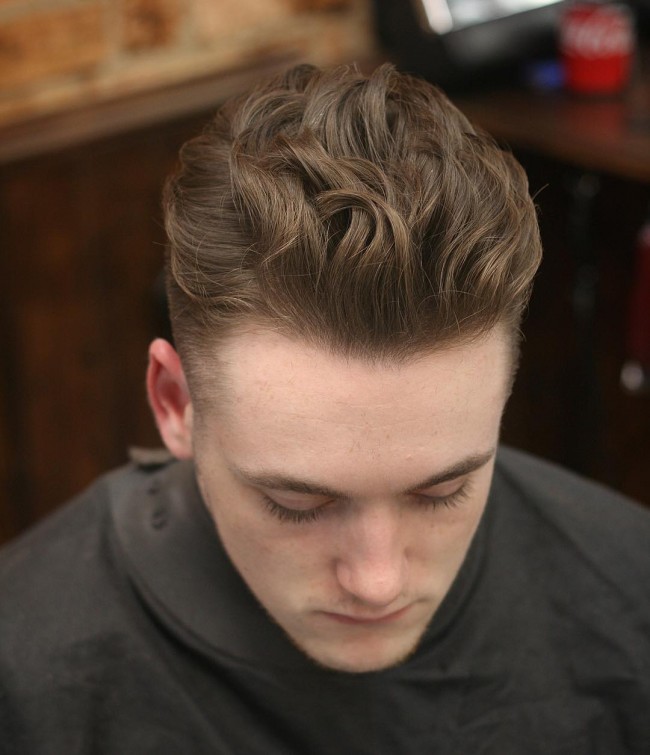 Long hair in waves, styled backwards