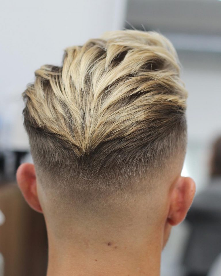 Fade on mid-length hair styled backwards